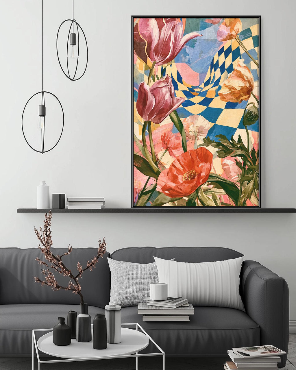 a large, colorful painting of flowers hanging on a wall above a gray couch in a living room setting.