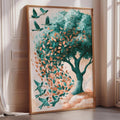 a large framed painting depicting a tree with green leaves and birds flying around it.