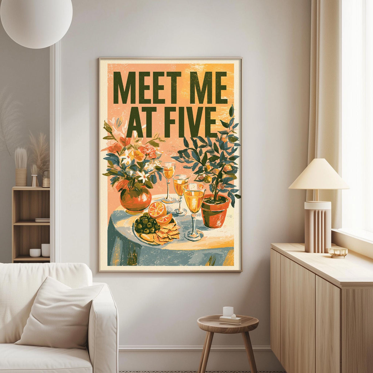 a living room with a framed poster on the wall that reads "Meet Me at Five". The poster depicts a table with various food items, including a vase of flowers, a plate of fruit, and a wine glass. The room also includes a couch, a lamp, and a small table.
