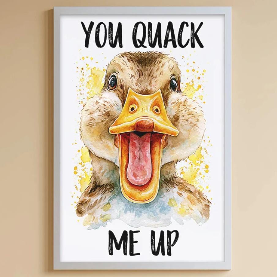 A child's bedroom with a stuffed rabbit, a bookshelf, and a framed poster featuring a duck with the text "YOU QUACK ME UP" above it.