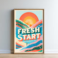 The image is a framed poster with a vibrant, colorful design featuring a sun, mountains, and a person walking. The text on the poster reads "FRESH START" and "SAME WONDERFUL YOU".