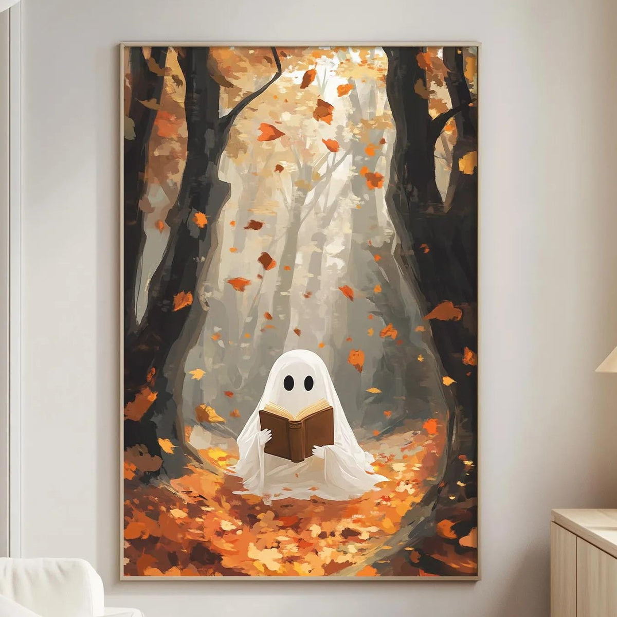 a cozy living room with a large painting of a ghost sitting in a forest surrounded by falling leaves. The painting is hanging on the wall, and the room has a comfortable couch and a small table nearby.