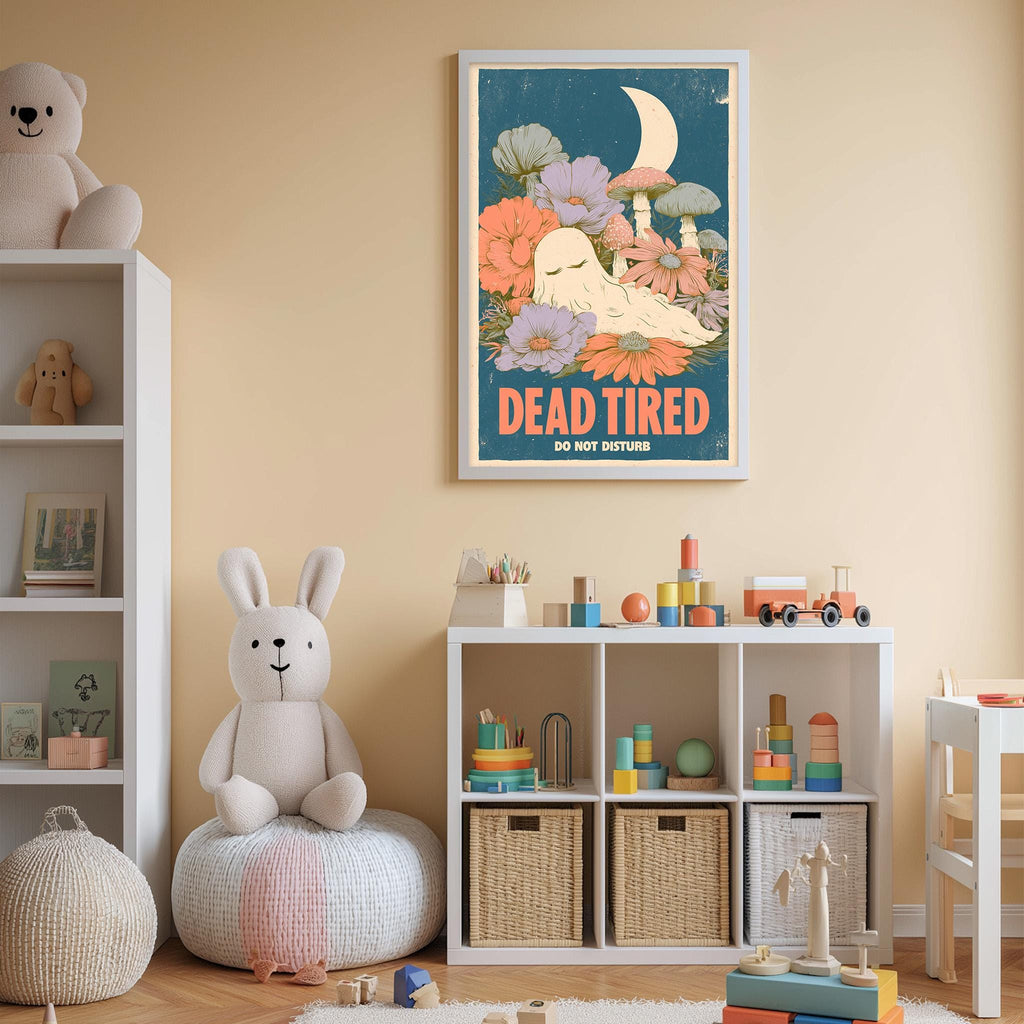 A child's bedroom with a white bookshelf, a stuffed rabbit, and a colorful poster on the wall. The poster features a whimsical illustration of a sleeping bunny surrounded by flowers and mushrooms, with the text "DEAD TIRED DO NOT DISTURB".