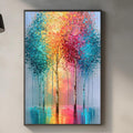 a kitchen counter with a framed painting of trees in a colorful, abstract style hanging above it. The painting is vibrant and eye-catching, adding a lively touch to the kitchen decor.