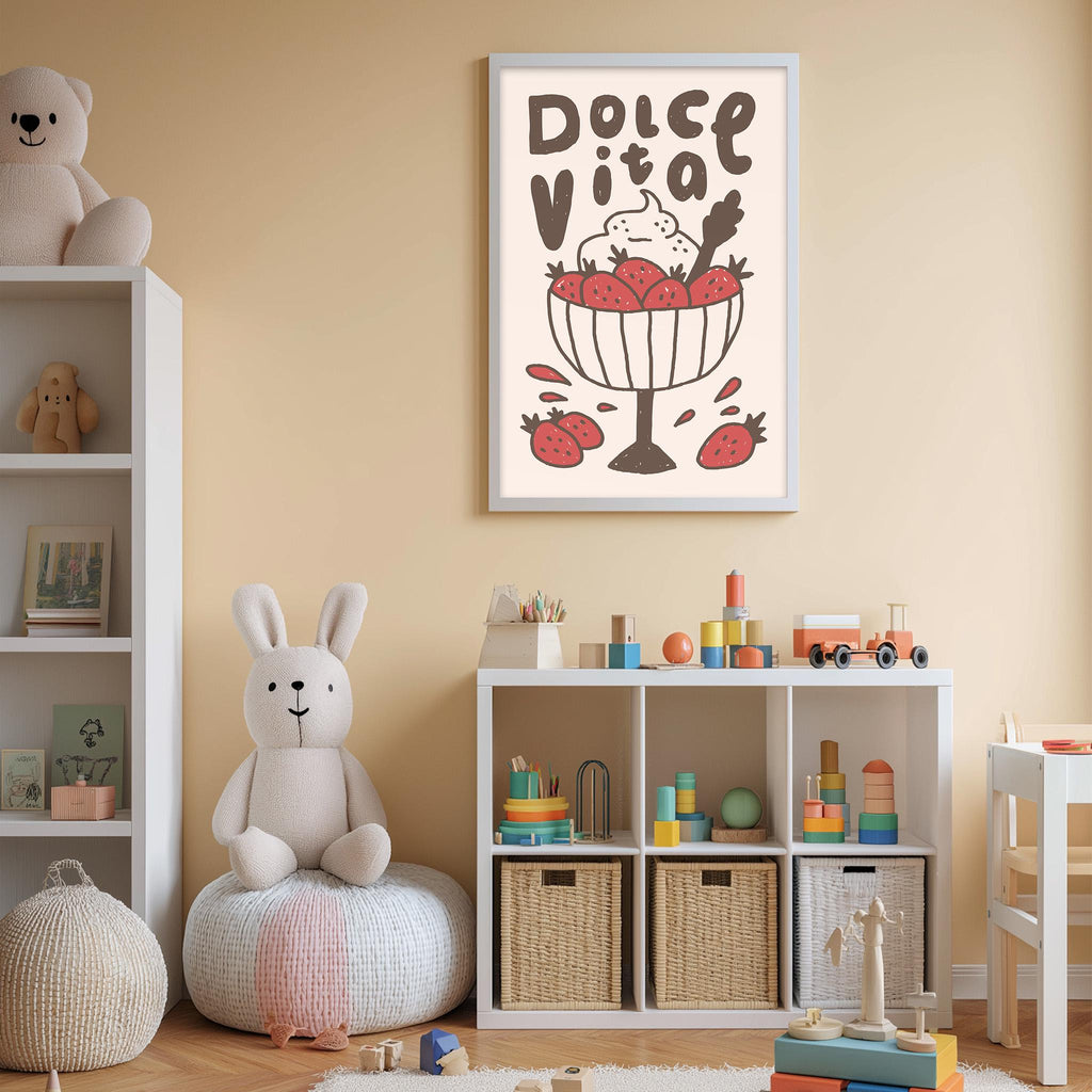 A child's bedroom with a white bookshelf, a stuffed rabbit, and a toy train. The wall has a framed poster with a cartoon illustration of a bowl of strawberries and cream.