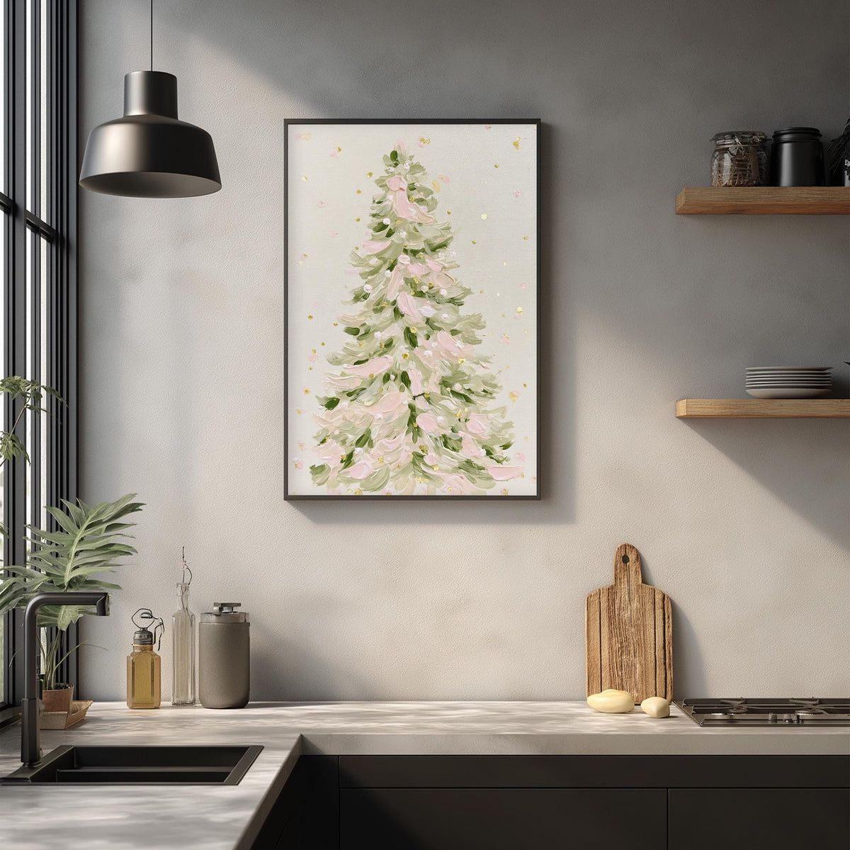 a kitchen counter with a framed picture of a tree hanging above it, along with various kitchen items such as a cutting board, a bottle, and a bowl.