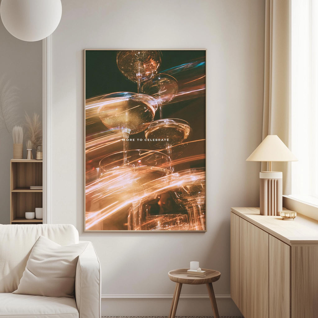 a large abstract painting hanging on a wall in a living room, with a white sofa and a wooden side table nearby.