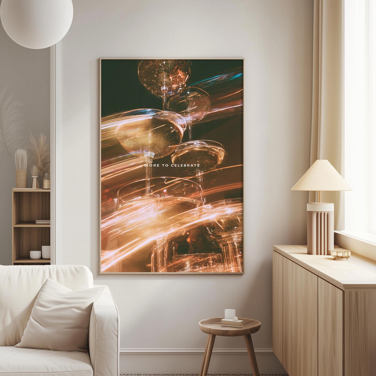 a large abstract painting hanging on a wall in a living room, with a white sofa and a wooden side table nearby.