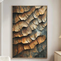 a large, abstract painting of a rocky surface with a textured, layered appearance, hanging on a wall in a modern living room setting.