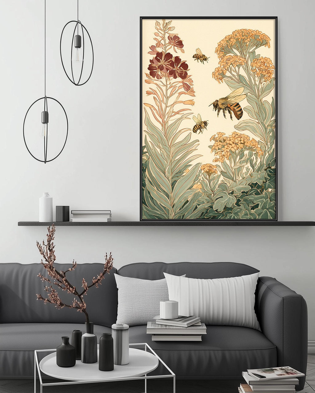 a living room with a gray sofa, a coffee table, and a large framed print of a floral illustration hanging on the wall above the sofa.
