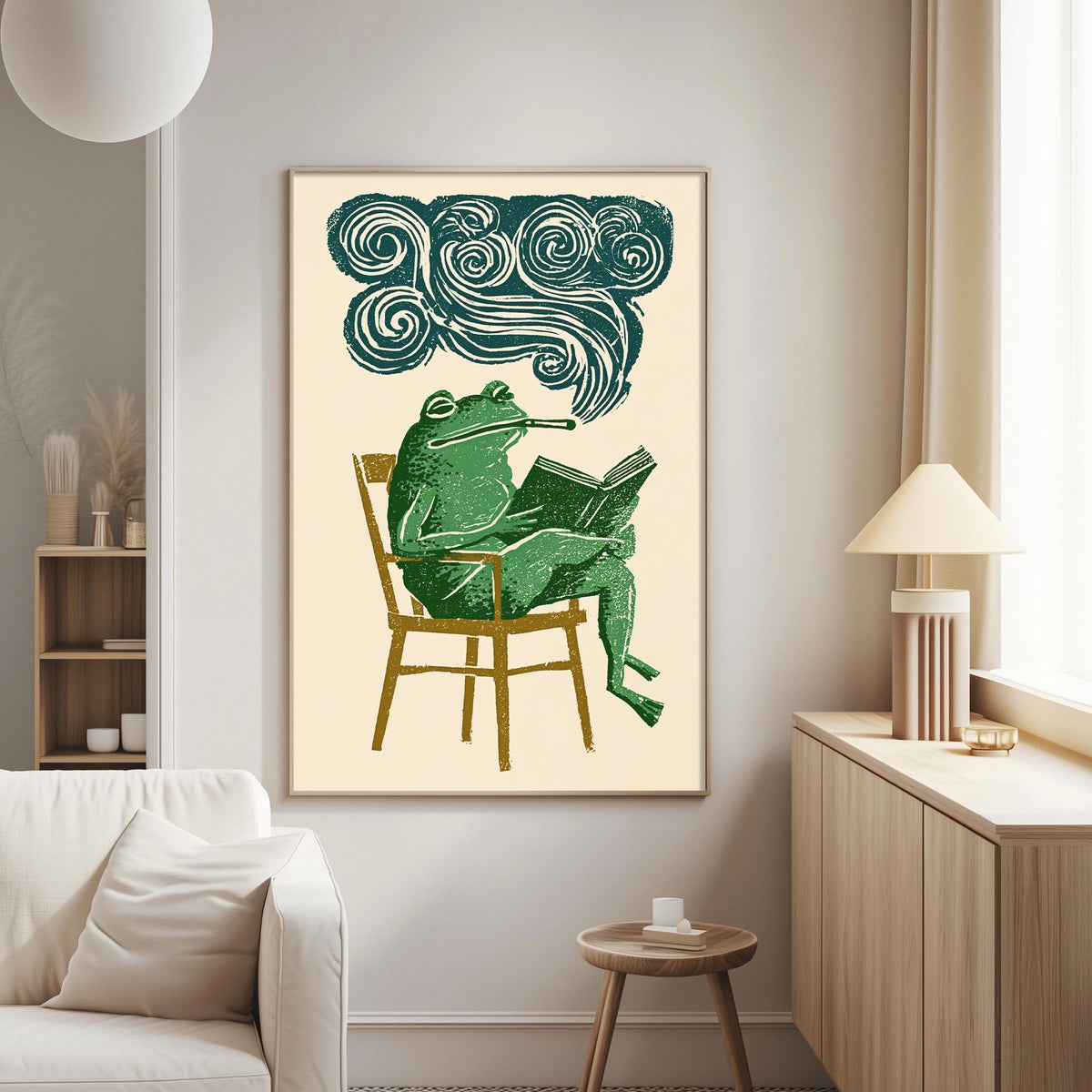 a green frog sitting in a chair and reading a book, with a cloud-like design above the frog.
