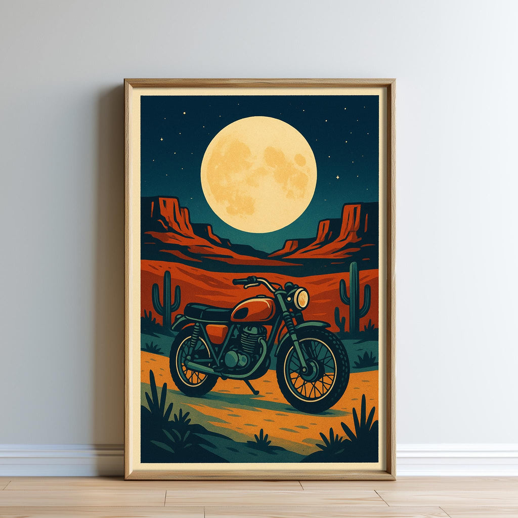 The image is a framed illustration depicting a motorcycle parked in a desert landscape under a large, bright moon.