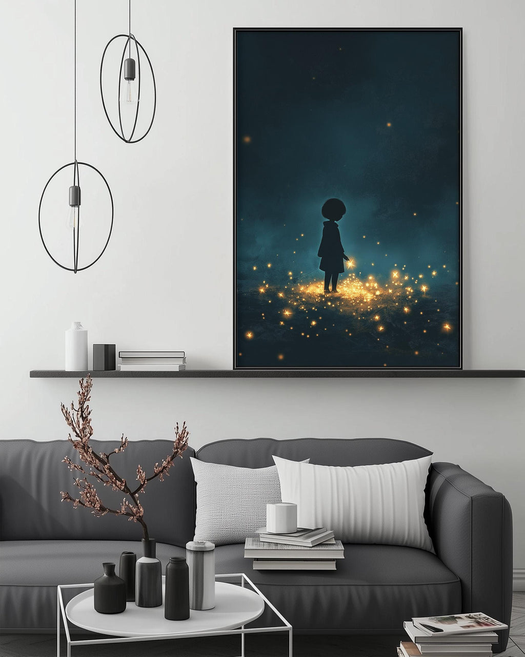 a cozy living room with a gray sofa, a coffee table, and a large framed artwork depicting a silhouetted figure standing in a field of twinkling lights.