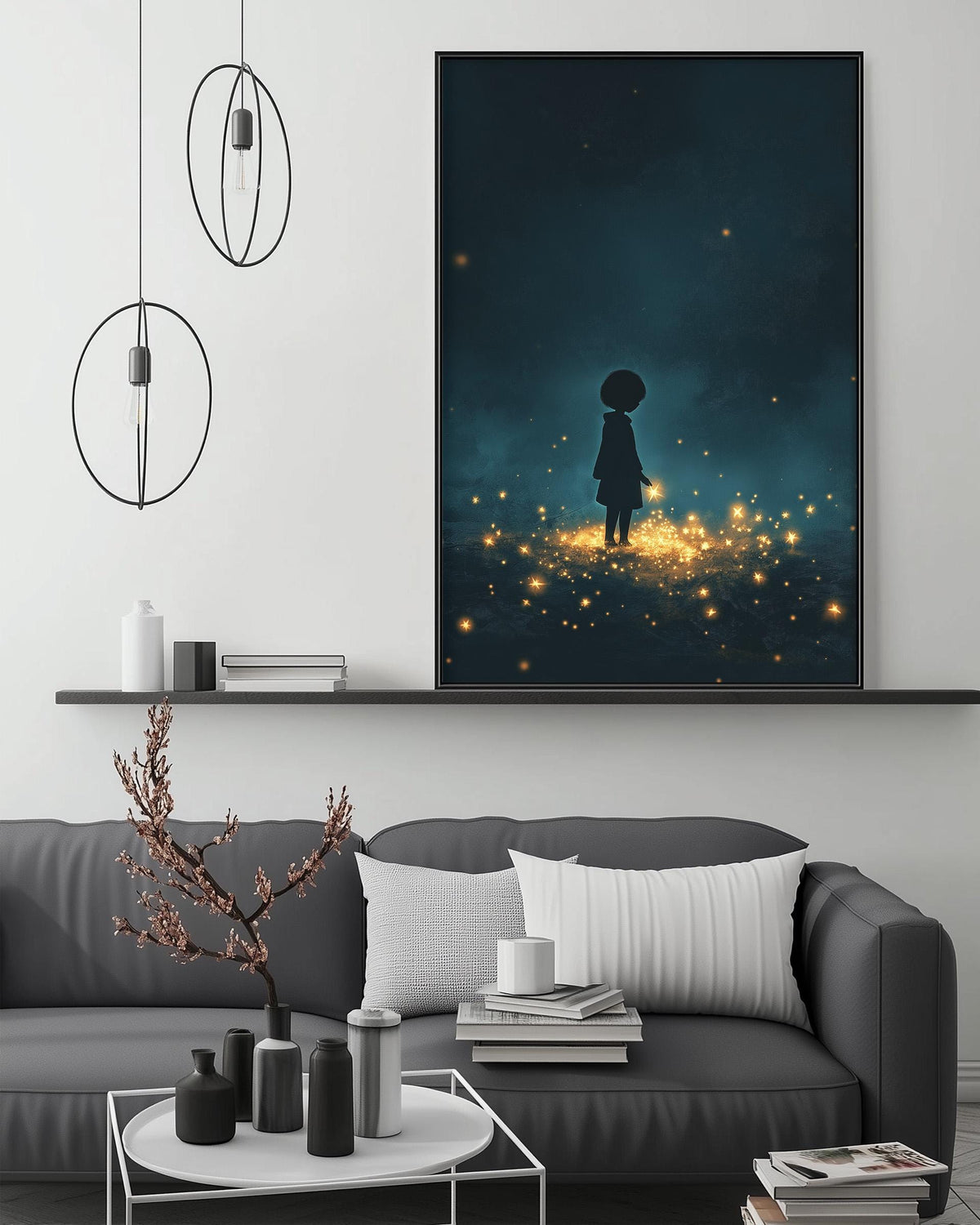 a cozy living room with a gray sofa, a coffee table, and a large framed artwork depicting a silhouetted figure standing in a field of twinkling lights.