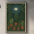a kitchen scene with a framed illustration of a greenhouse filled with plants hanging on the wall above a countertop with various kitchen items.