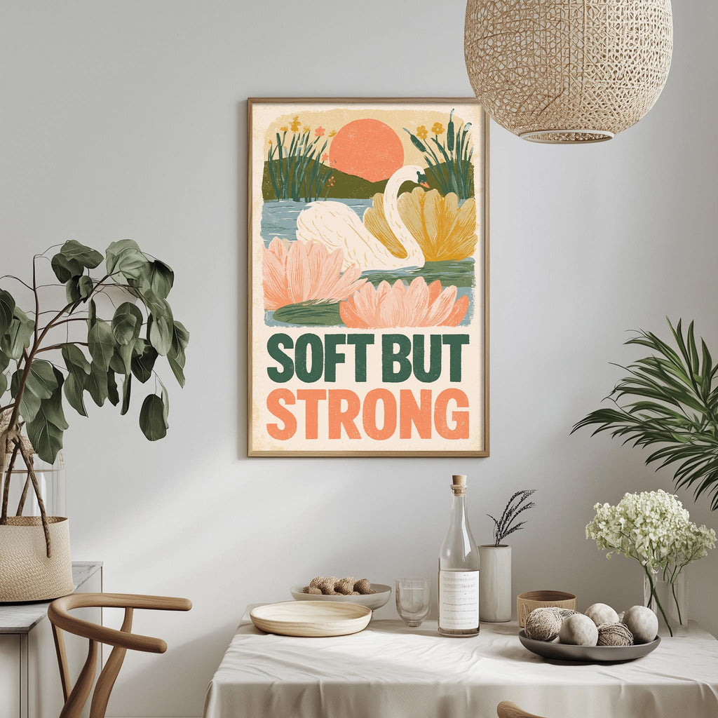 a framed poster with a colorful illustration of a swan and flowers, hanging on a wall above a dining table with various decorative items and plants.