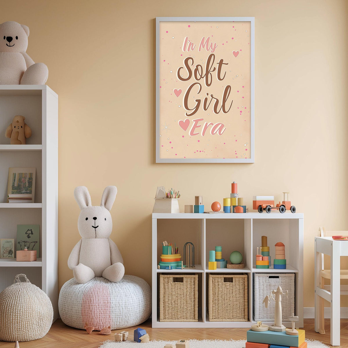 A cozy and colorful children's bedroom with a large stuffed bunny, shelves filled with toys, and a framed poster on the wall that reads "In My Soft Girl Era".
