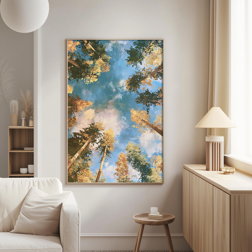 a serene living room with a large framed painting of a forest scene hanging on the wall, featuring a blue sky with clouds and trees in various shades of green and yellow.