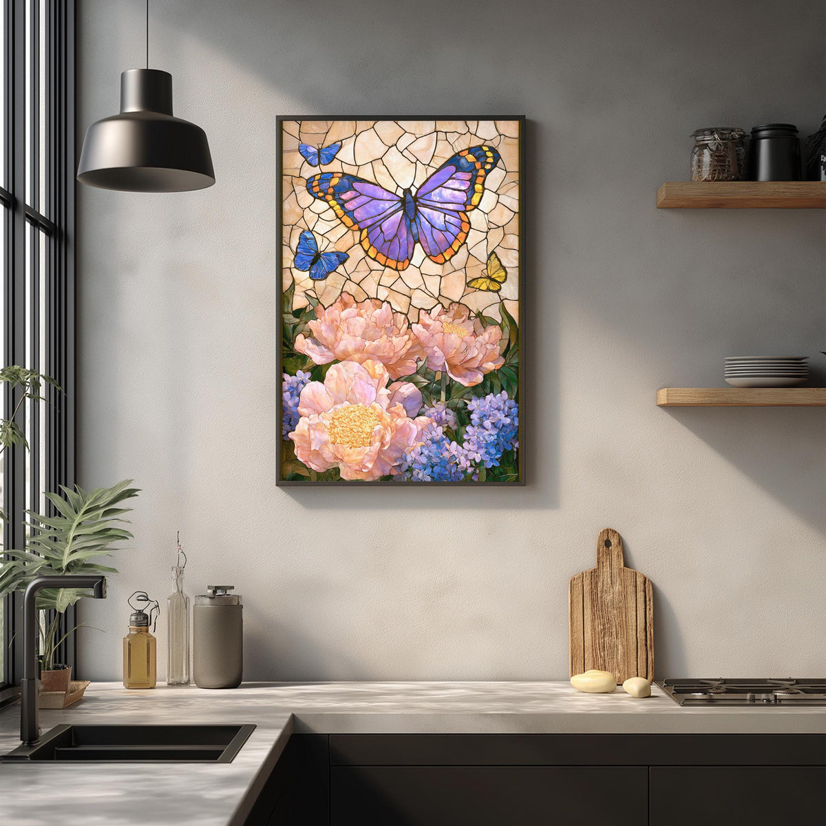 a kitchen counter with a framed painting of a butterfly surrounded by flowers hanging above it.