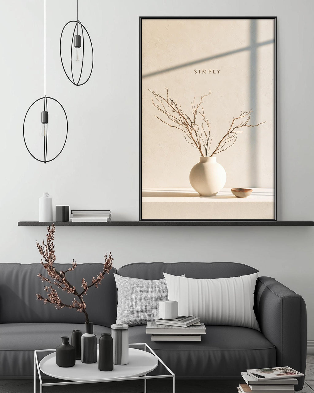 a modern living room with a gray sofa, a coffee table, and a large framed artwork depicting a vase with branches and a bowl on a shelf.