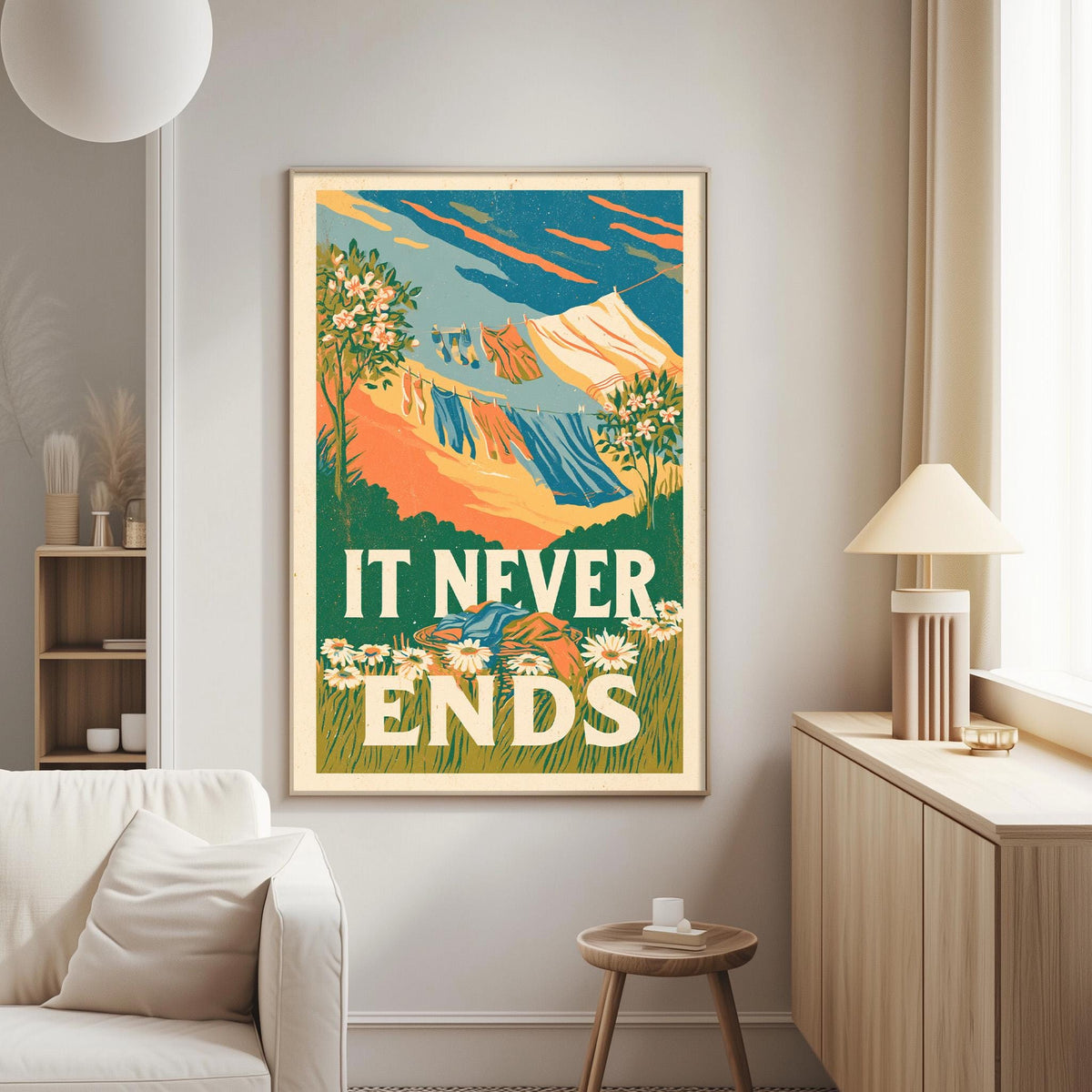 a large framed poster with a colorful illustration of mountains and flowers hanging on a wall in a living room.
