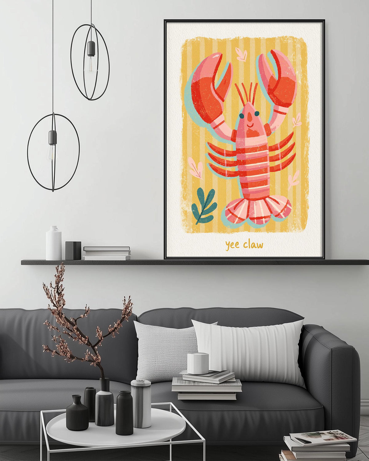 a framed illustration of a lobster on a wall, with a cozy living room setting in the background.