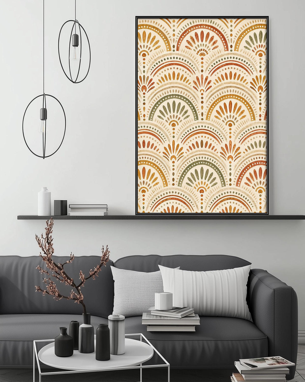 a modern living room with a gray sofa, a coffee table, and a large framed print of an abstract pattern on the wall above the sofa.