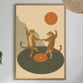 a framed illustration of two tigers dancing on a record player, surrounded by various decorative elements such as plants, a bowl, and a bottle.