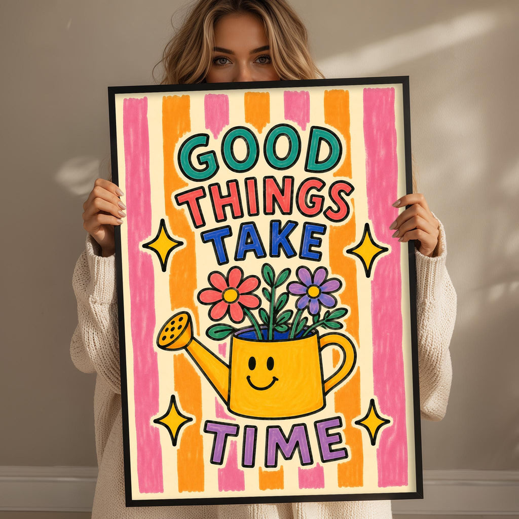 A woman holding a framed poster with a colorful design and text.