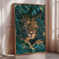A framed painting of a jaguar resting in lush green foliage, with its striking orange and black spotted face visible through the leaves.