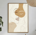 a minimalist dining room with a table set for two, a potted plant, a framed abstract portrait, and a hanging light fixture.