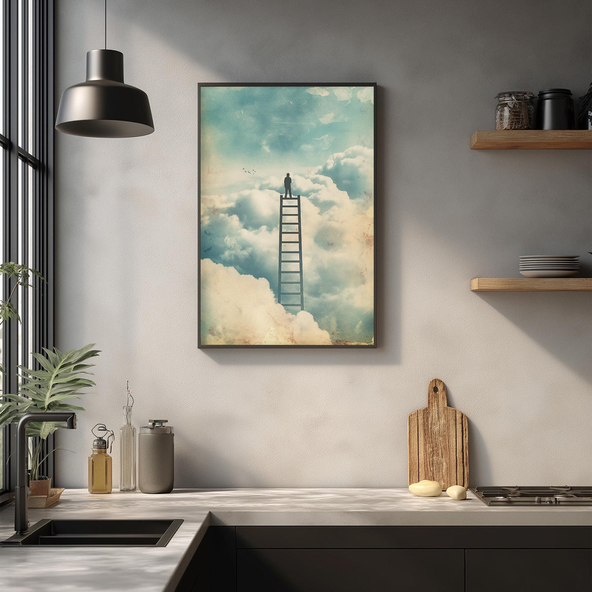 a kitchen counter with a framed picture of a person standing on a ladder, looking out over a cloudy sky.