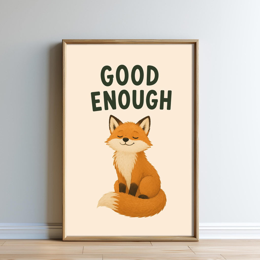 a framed poster with a cartoon illustration of a fox sitting and smiling. The text above the illustration says "GOOD ENOUGH".
