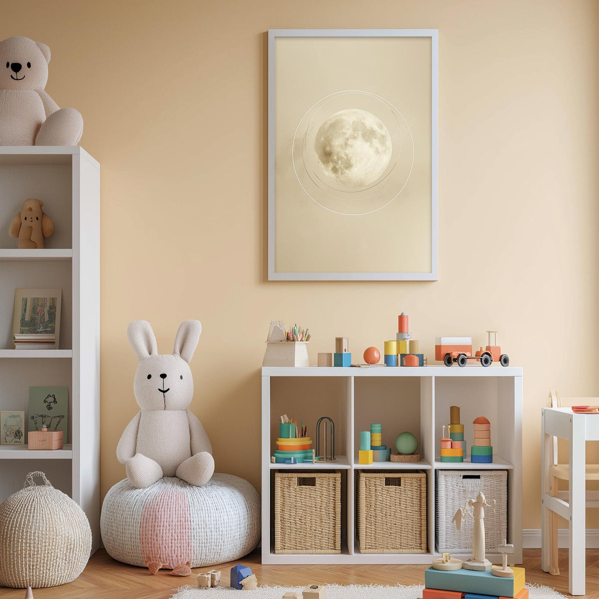 A cozy children's bedroom with a stuffed rabbit, a bookshelf, and a toy storage unit filled with toys and books. A framed image of a moon is displayed on the wall above the storage unit.