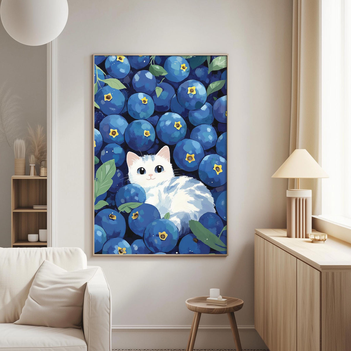 A large framed painting depicting a white cat surrounded by blueberries hangs on the wall of a cozy living room.