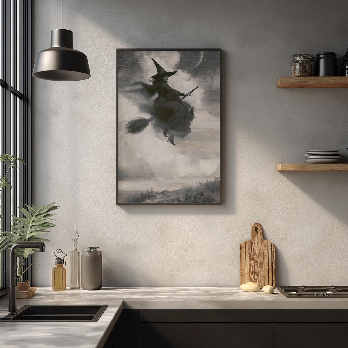a kitchen scene with a framed picture of a witch on a broomstick hanging on the wall above a wooden cutting board and a sink.