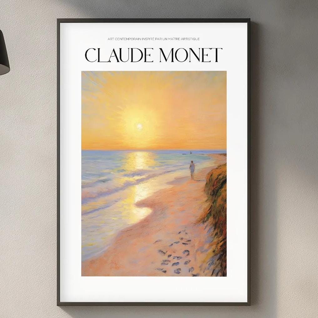 a framed painting of a beach scene with a sunset, hanging on a wall above a kitchen counter with various kitchen items and decor.