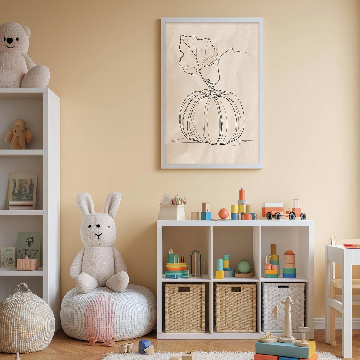A cozy and colorful children's bedroom with a white bookshelf, a stuffed rabbit, and a framed drawing of a pumpkin on the wall.