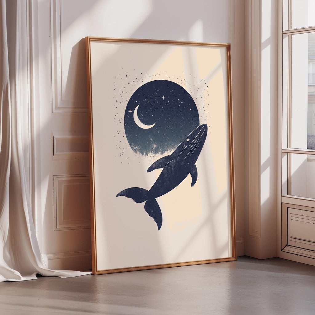 a framed artwork depicting a whale against a night sky background with a crescent moon and stars.