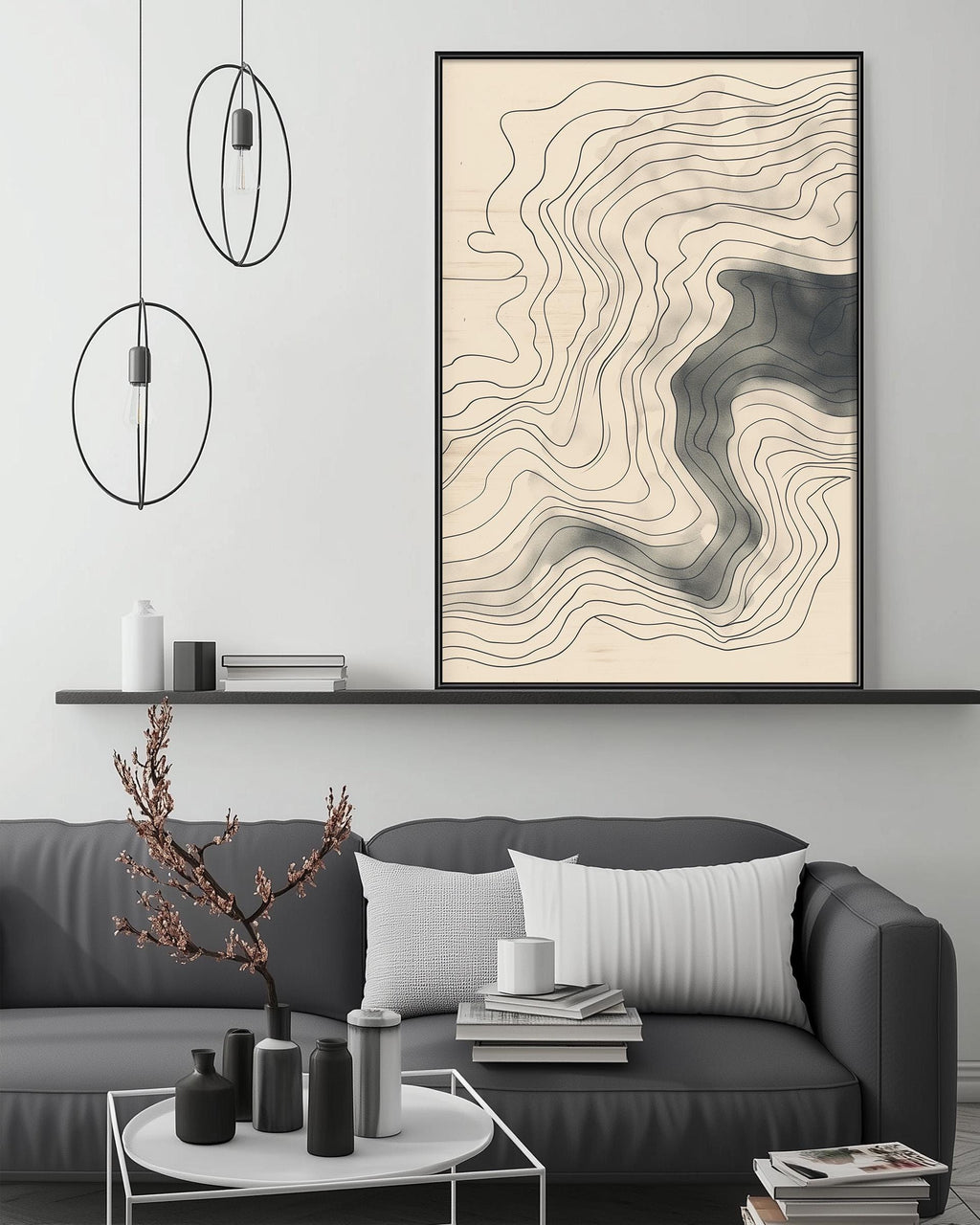 a modern living room with a gray sofa, a coffee table, and a large abstract painting hanging on the wall above the sofa.