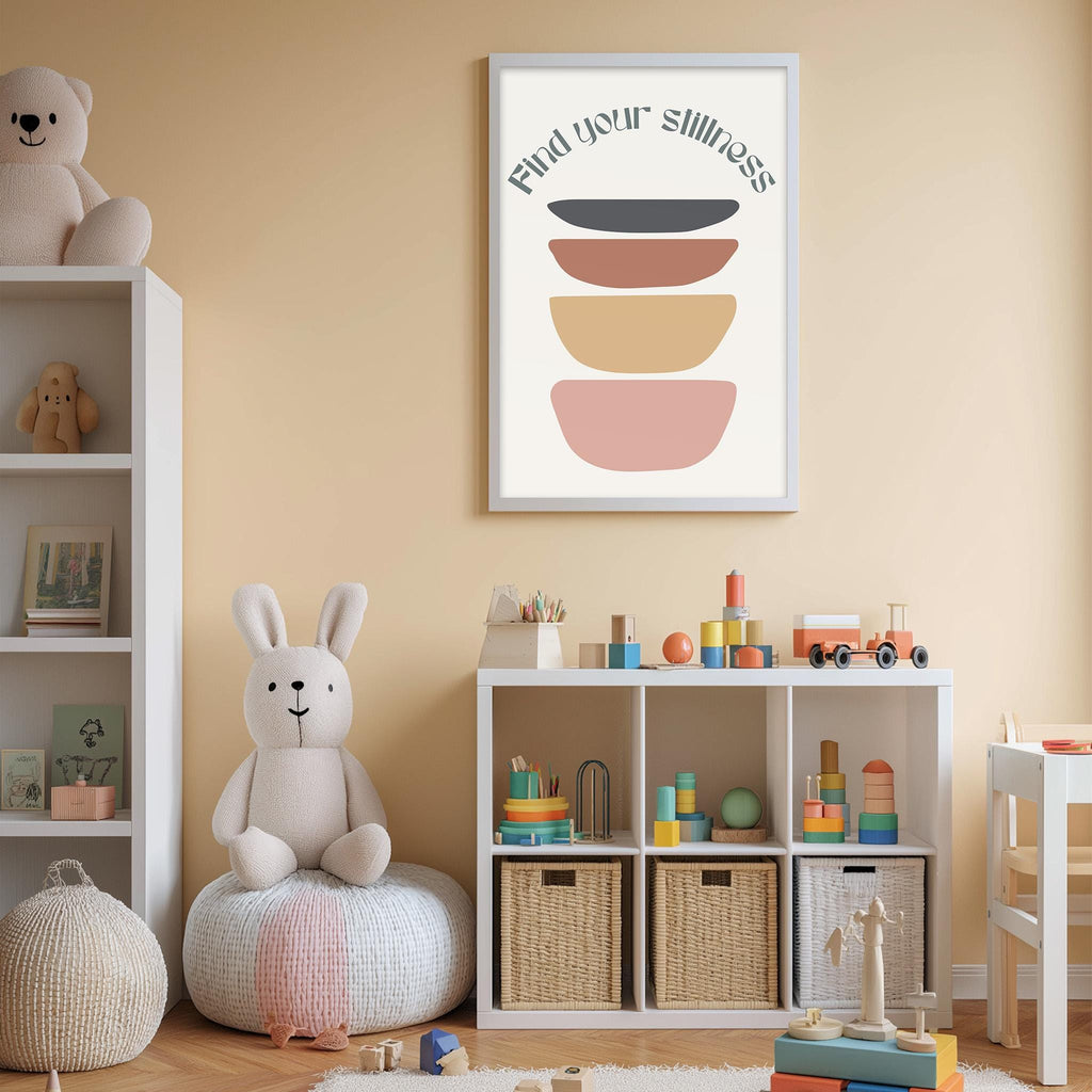 A cozy and colorful children's bedroom with a white bookshelf, a plush rabbit, and a toy train set. The room has a warm and inviting atmosphere, with a framed poster on the wall that reads "Find your silliness".