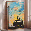 A framed painting depicting a silhouette of a person standing on a road with a van, surrounded by birds flying overhead against a colorful sky.