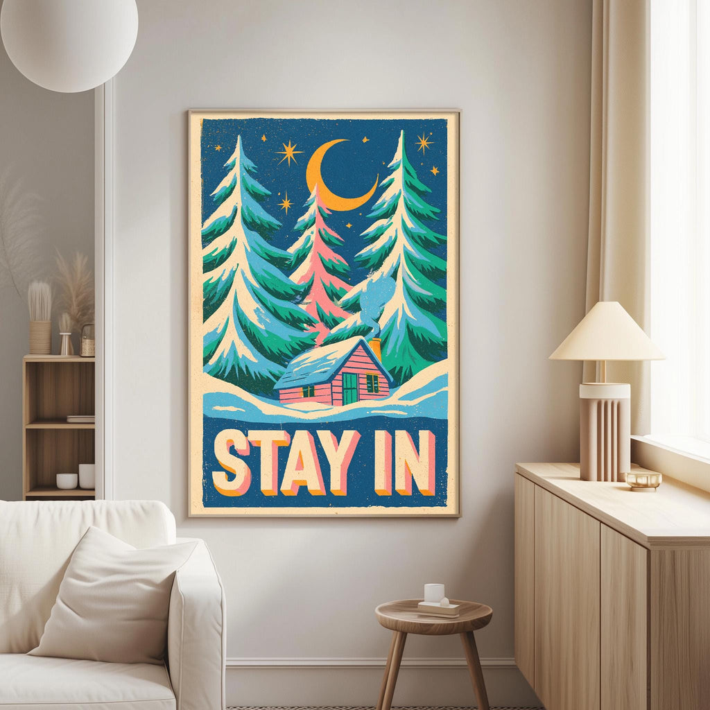 a cozy living room with a large poster on the wall that reads "STAY IN".