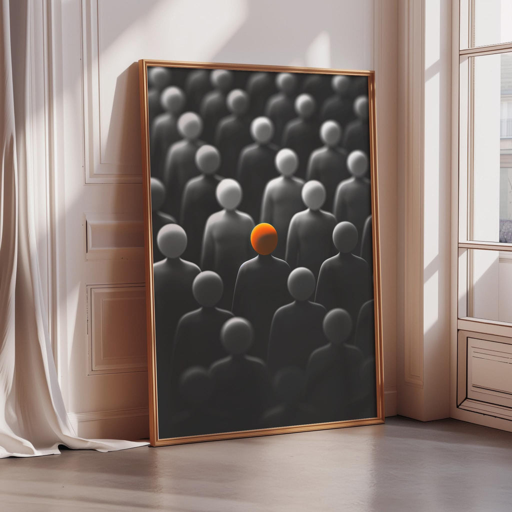 a large framed artwork depicting a group of people, with one individual standing out in the center as an orange ball.