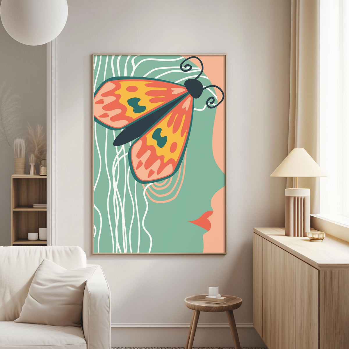 a large abstract painting of a butterfly on a wall in a living room.