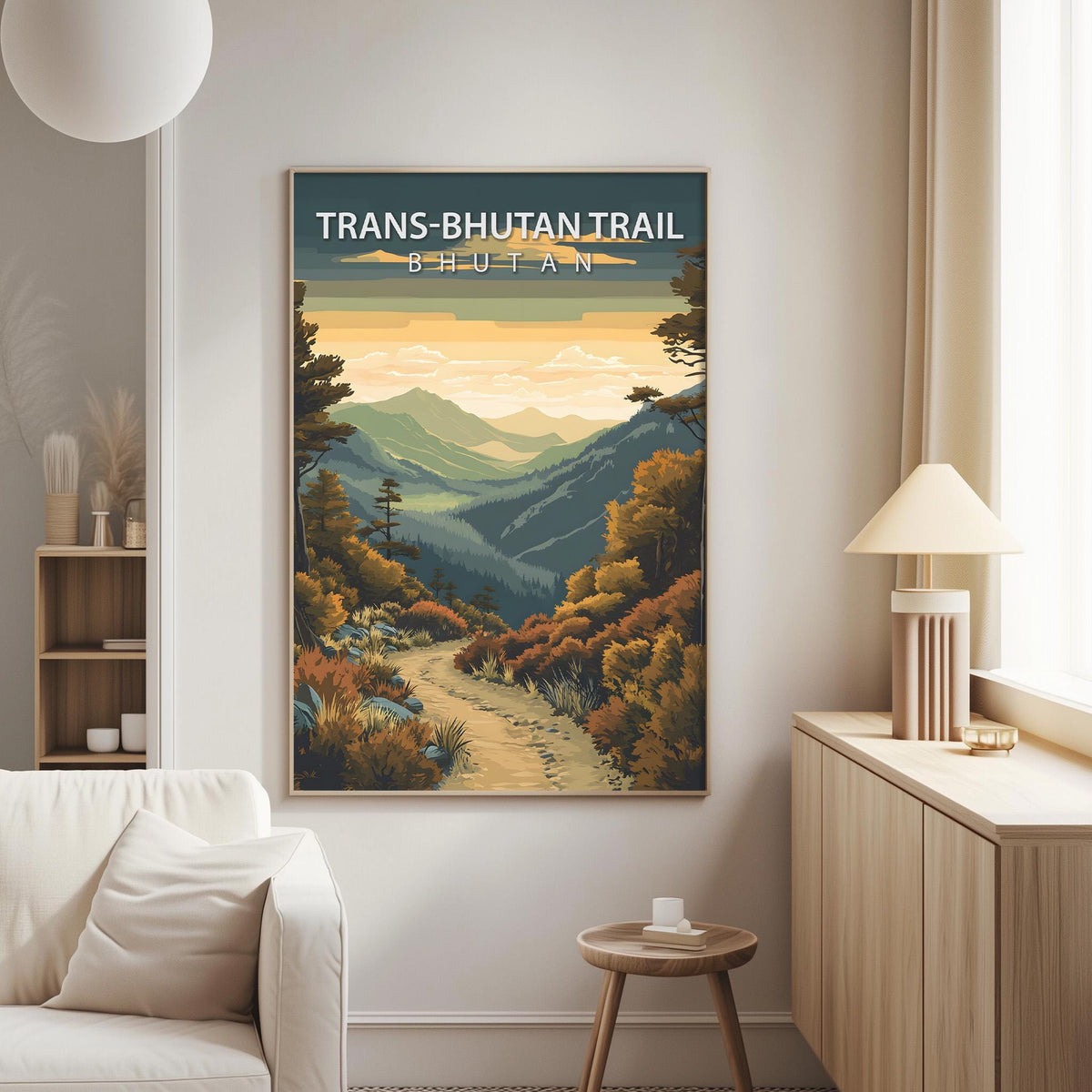 a poster of a scenic mountain landscape with a winding path, hanging on a wall in a living room.