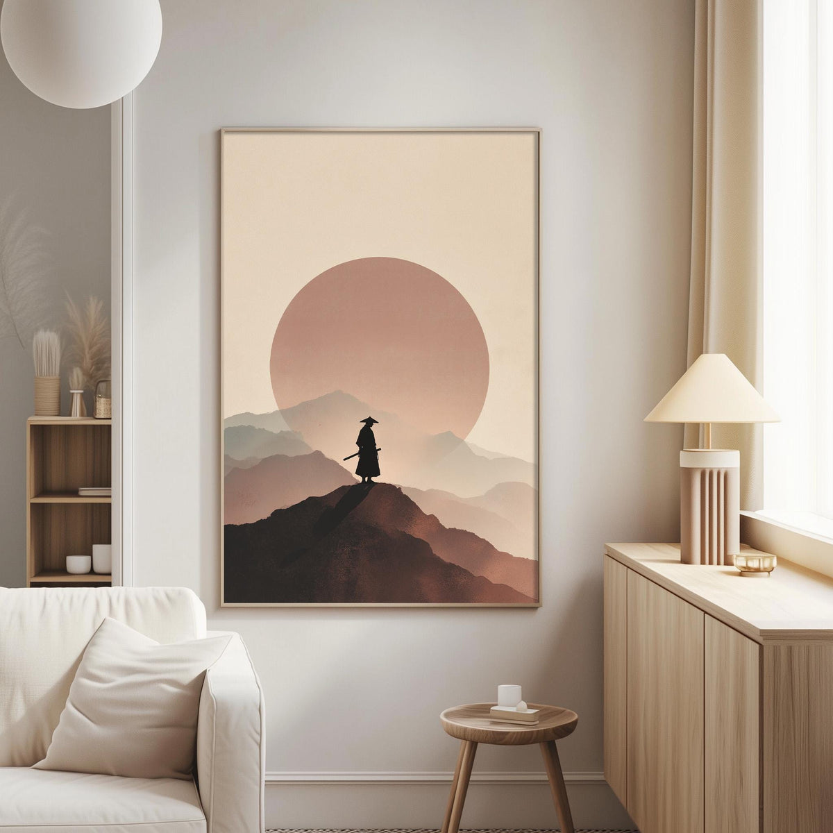 a serene living room with a large framed picture of a person standing on a mountain peak, silhouetted against a sunset-like sky.