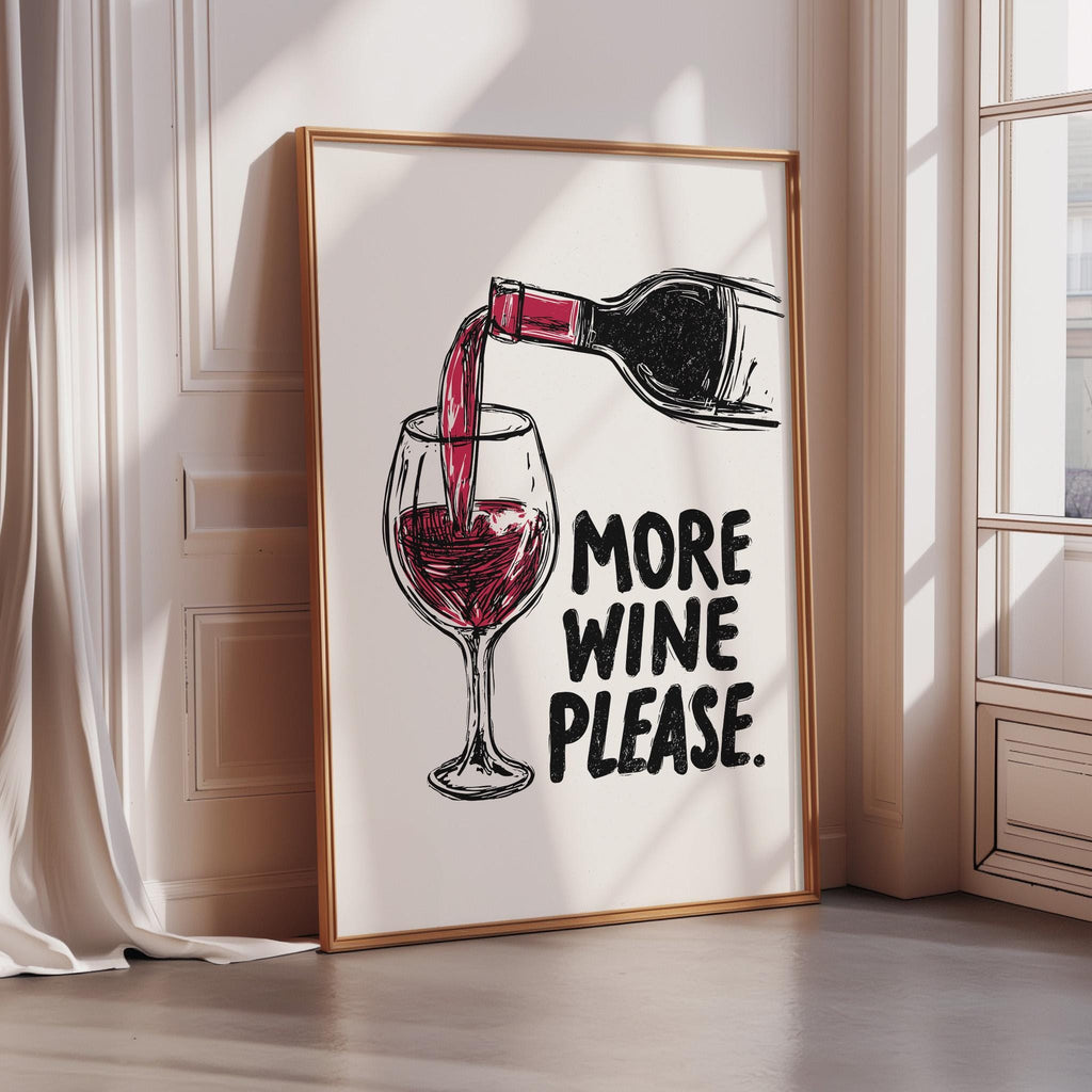 a framed poster with a wine glass and a bottle of wine, along with the text "MORE WINE PLEASE" written on it.