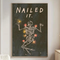 a poster with a skeleton and the text "Nailed it."
