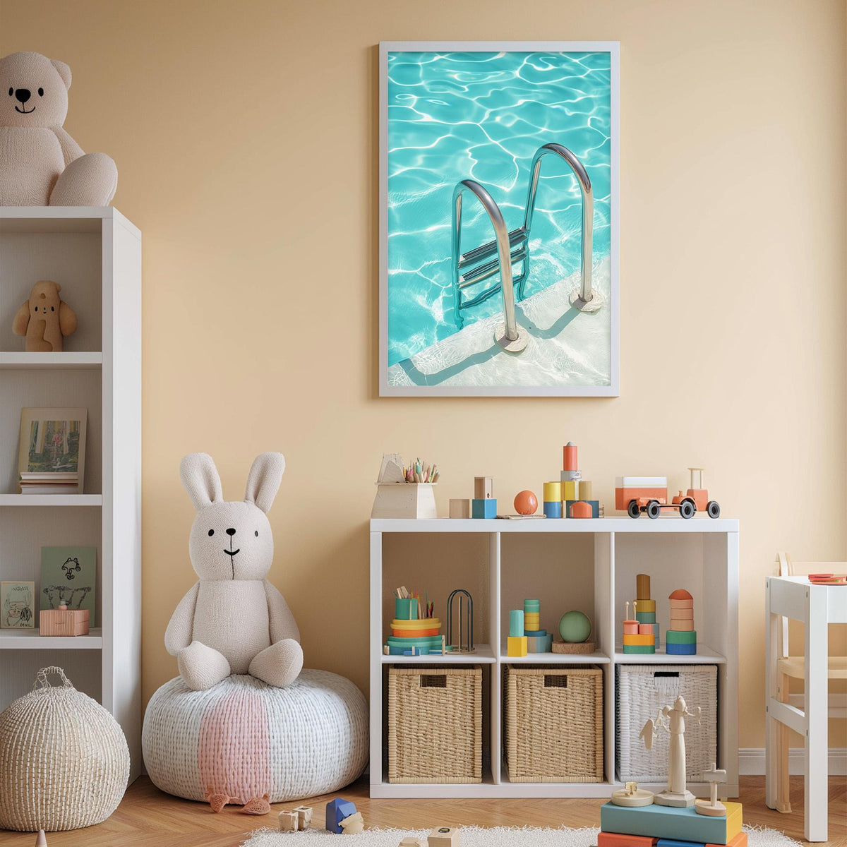 A child's bedroom with a white bookshelf, a stuffed rabbit, and a toy train. The walls are painted a light peach color, and there is a framed picture of a swimming pool with a ladder hanging above the bookshelf.